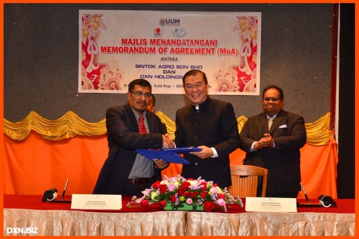Majlis menandatangani antara Sintok Agro Sdn BHD dan DXN Holdings BHD