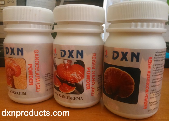 Ganoderma exracts from DXN company are sold in small white bottles.